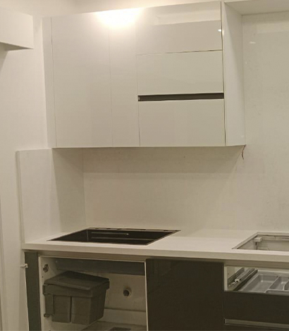 Space-saving corner cabinet designs for efficient storage in kitchens and bathrooms.