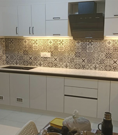 Tailored kitchen cabinet solutions in Bangalore, blending functionality with aesthetic appeal.
